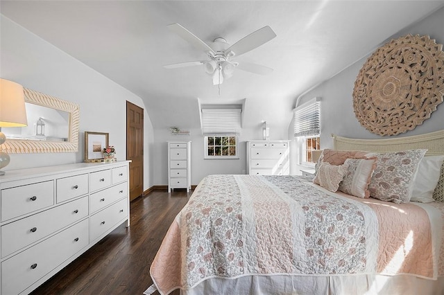 bedroom featuring baseboards, a ceiling fan, and dark wood-type flooring