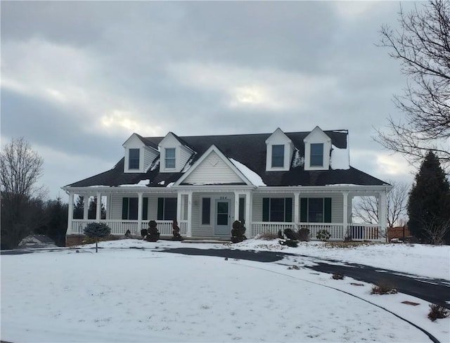 cape cod home with covered porch