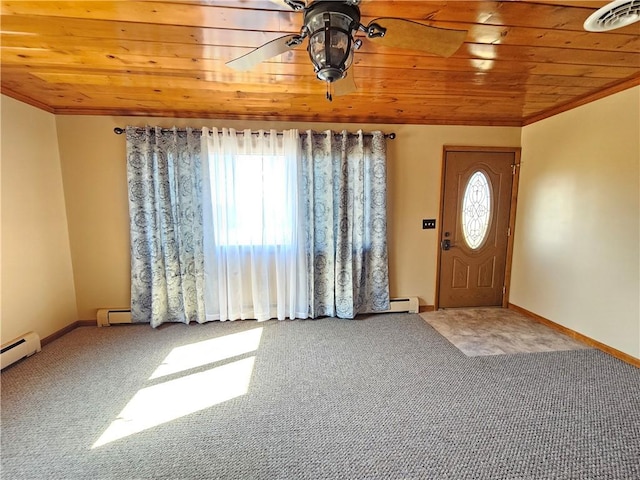 carpeted foyer entrance with visible vents, ceiling fan, baseboards, wood ceiling, and ornamental molding