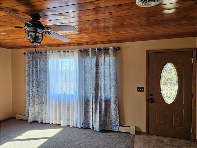 carpeted entrance foyer featuring a baseboard heating unit, wooden ceiling, baseboards, and ceiling fan