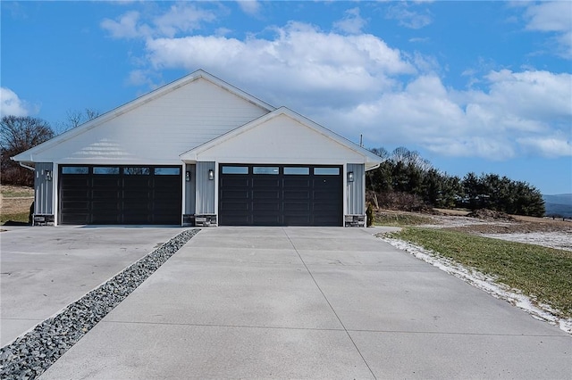 exterior space featuring concrete driveway