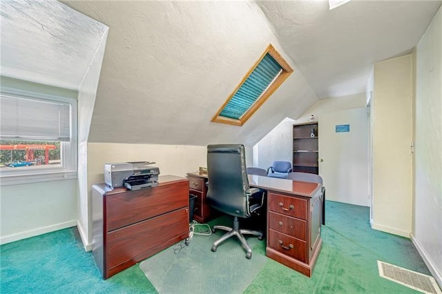 office area with baseboards, carpet, visible vents, and a textured ceiling