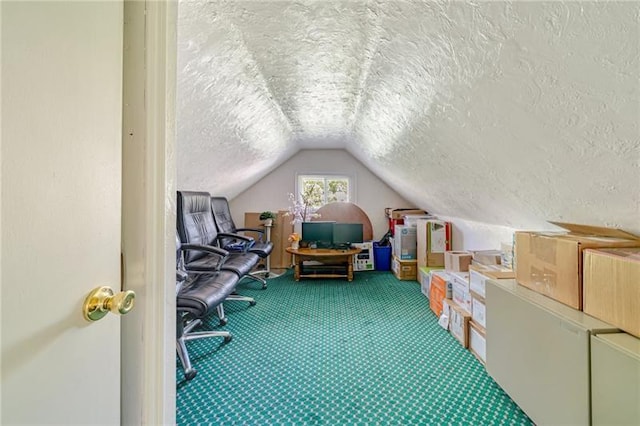 interior space with a textured ceiling, vaulted ceiling, and carpet flooring
