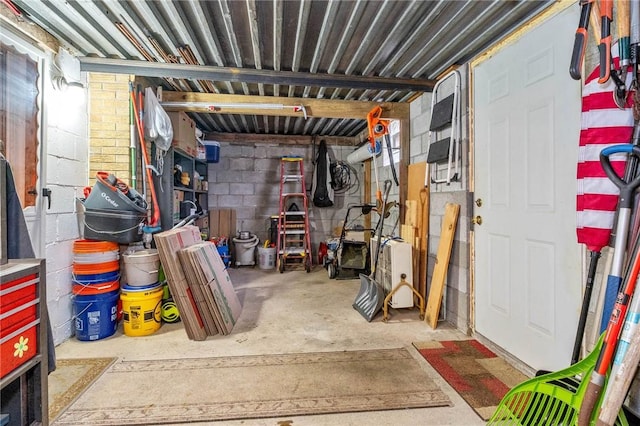 basement featuring concrete block wall