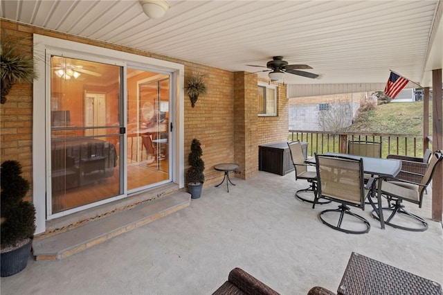 view of patio featuring a ceiling fan and outdoor dining space