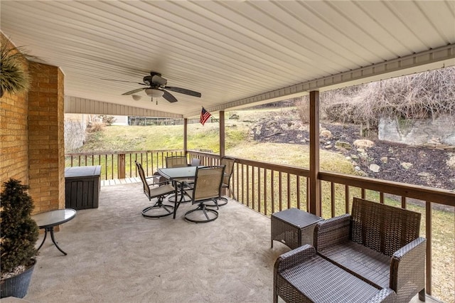 view of patio / terrace with outdoor dining area and ceiling fan