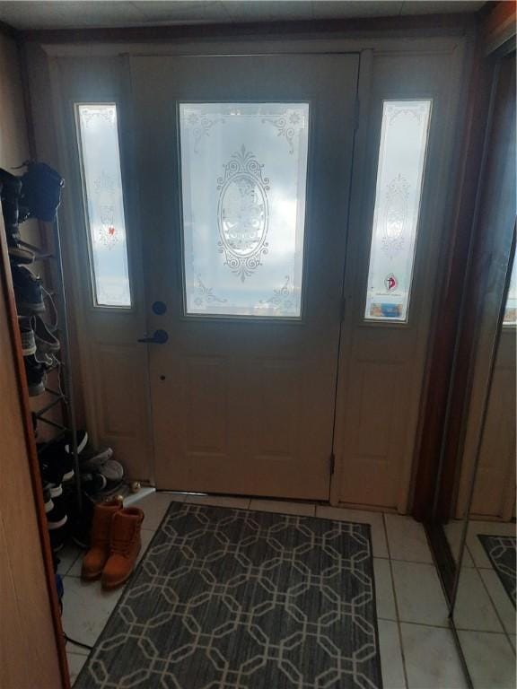 entrance foyer with light tile patterned flooring