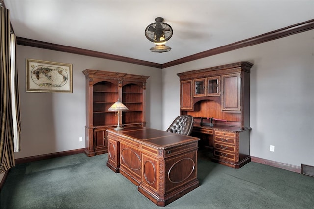 carpeted home office featuring ornamental molding and baseboards