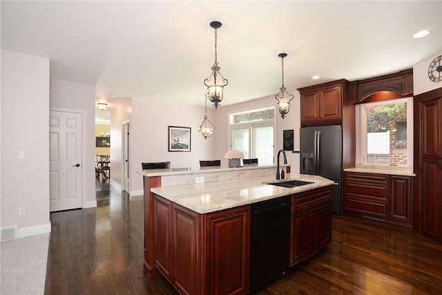 kitchen with plenty of natural light, black dishwasher, a sink, and stainless steel fridge with ice dispenser