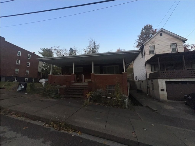 view of front facade featuring covered porch