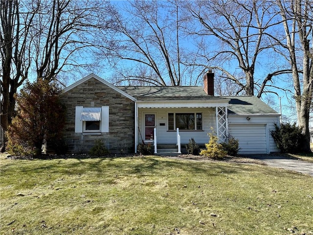 single story home with a porch, a garage, dirt driveway, stone siding, and a front yard