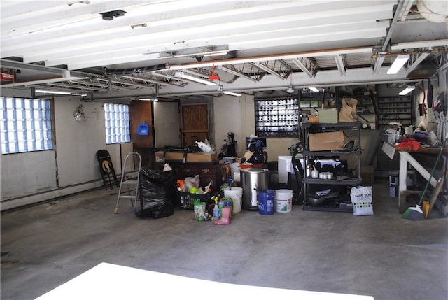 garage with a baseboard heating unit