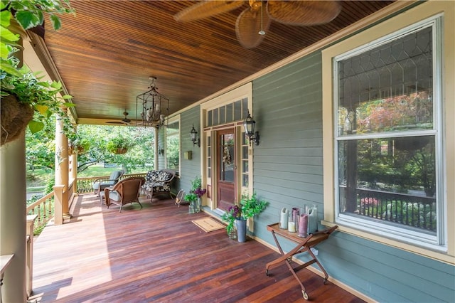 deck featuring a porch and a ceiling fan