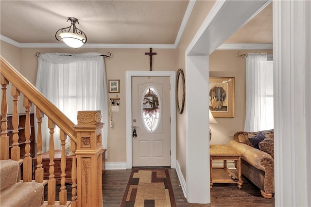 entryway with stairs, baseboards, dark wood finished floors, and crown molding