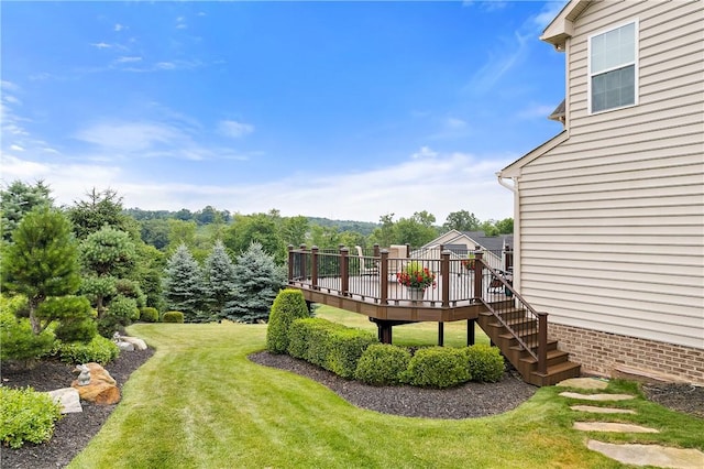 view of yard featuring a wooden deck