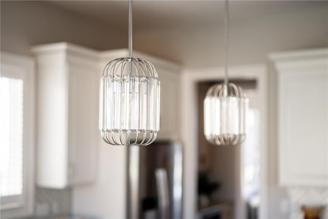 interior details with an inviting chandelier