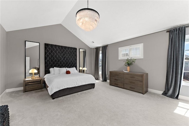 carpeted bedroom featuring vaulted ceiling, baseboards, and an inviting chandelier