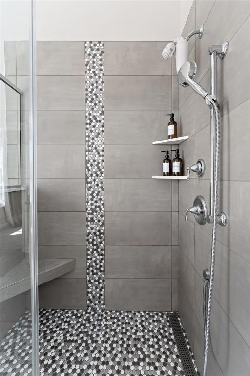 bathroom with a stall shower