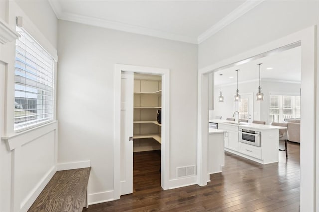 interior space with visible vents and a sink