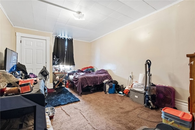 carpeted bedroom with ornamental molding