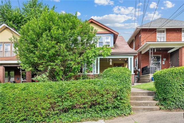 view of front of property with brick siding