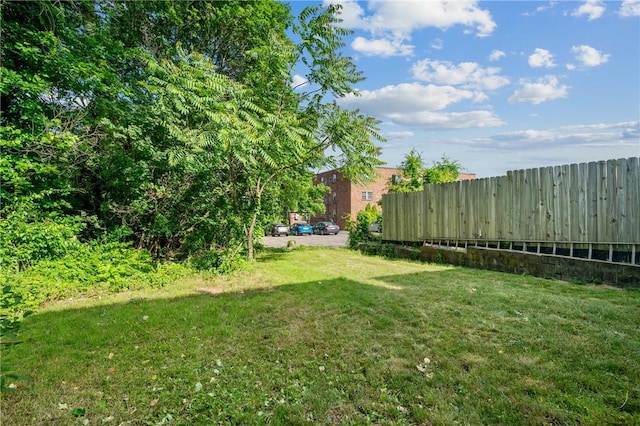 view of yard featuring fence