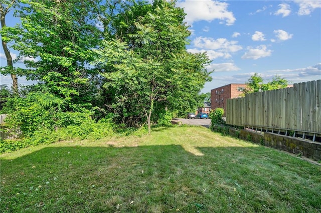 view of yard with fence