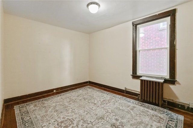 7807 Union Ave, Swissvale, PA 15218 - unfurnished room featuring radiator and wood finished floors
