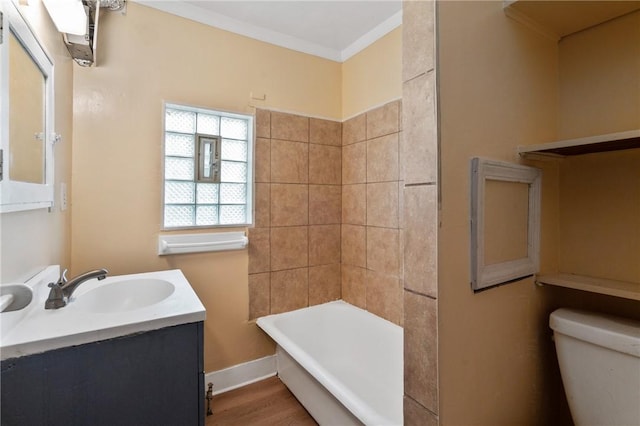 7807 Union Ave, Swissvale, PA 15218 - bathroom with vanity, crown molding, and wood finished floors