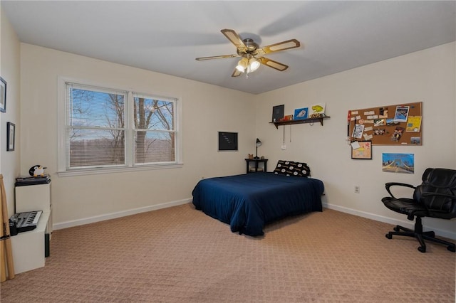 bedroom with baseboards, ceiling fan, and light colored carpet