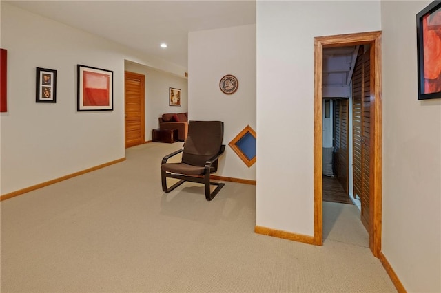 sitting room featuring recessed lighting, carpet, and baseboards