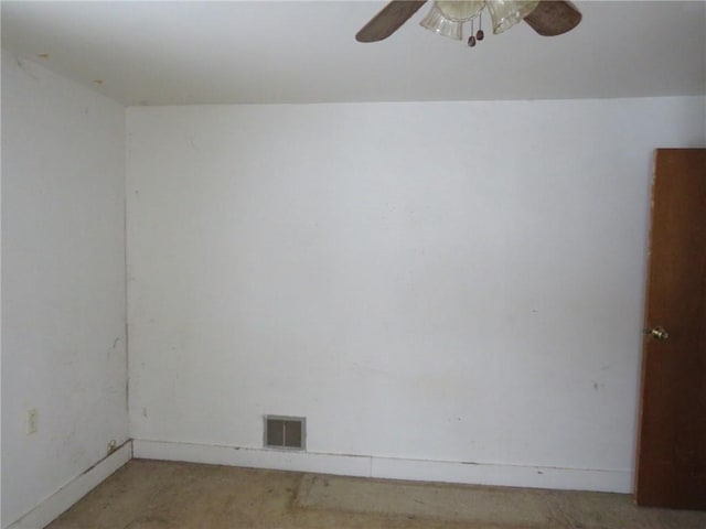 spare room with visible vents and a ceiling fan