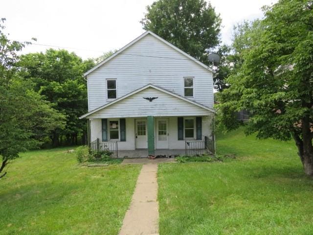 8 Ziskind Rd, East Bethlehem, PA 15333 - view of front of home featuring covered porch and a front yard