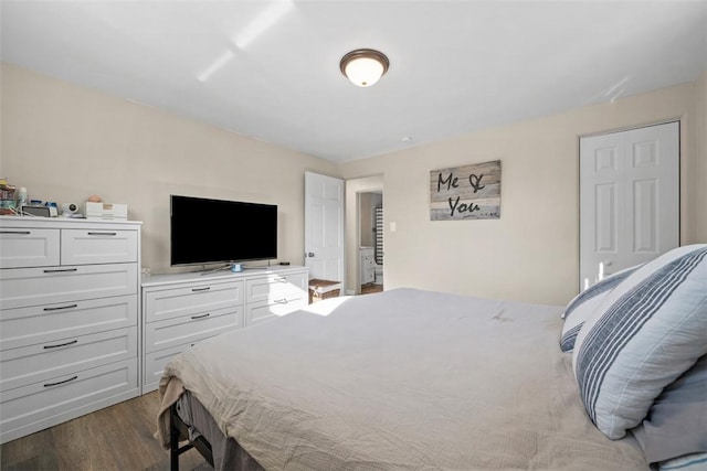 bedroom featuring wood finished floors