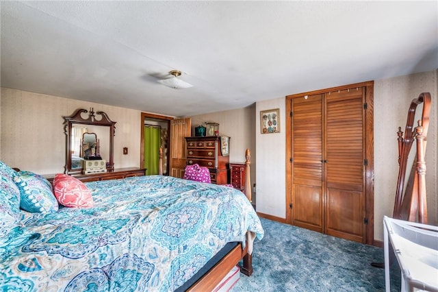 carpeted bedroom featuring baseboards