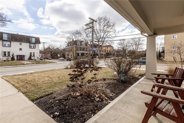 view of yard featuring a residential view