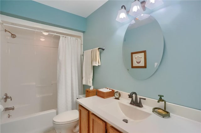 bathroom with vanity, toilet, and shower / tub combo with curtain