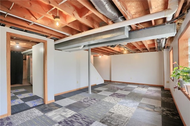 unfinished basement with baseboards