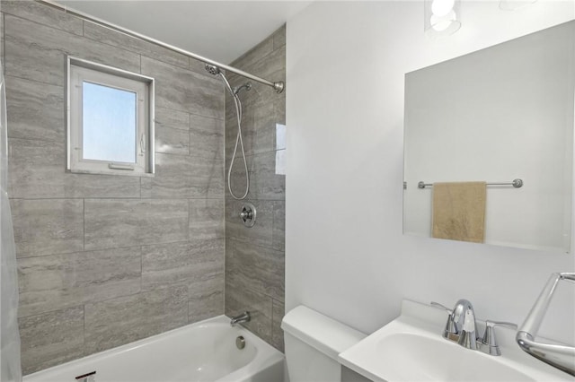 bathroom featuring toilet,  shower combination, and vanity