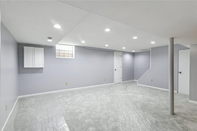 basement with recessed lighting and baseboards