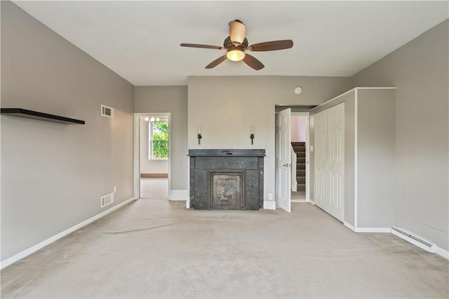 2101 Lonsdale St, Reserve, PA 15212 - unfurnished living room with a baseboard heating unit, ceiling fan, baseboards, a fireplace, and carpet flooring