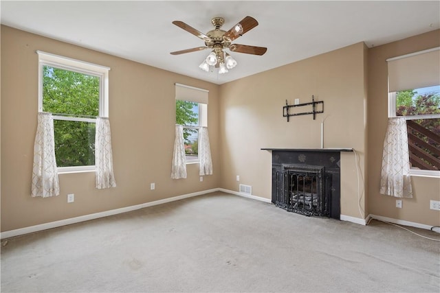 2101 Lonsdale St, Reserve, PA 15212 - unfurnished living room with carpet, healthy amount of natural light, a fireplace, and baseboards