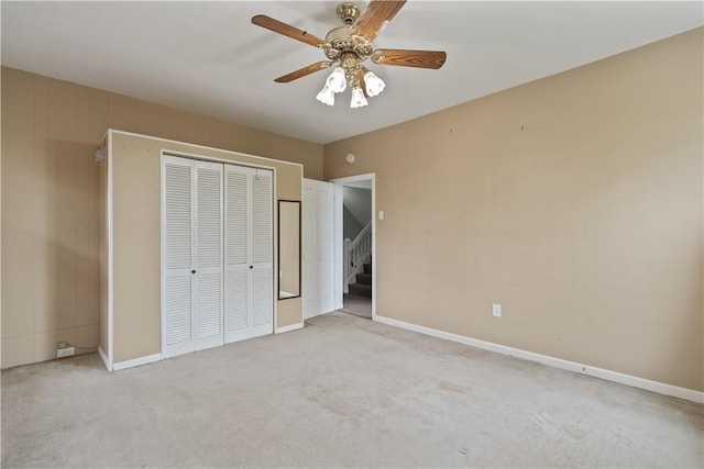 2101 Lonsdale St, Reserve, PA 15212 - unfurnished bedroom featuring light colored carpet, a closet, baseboards, and a ceiling fan