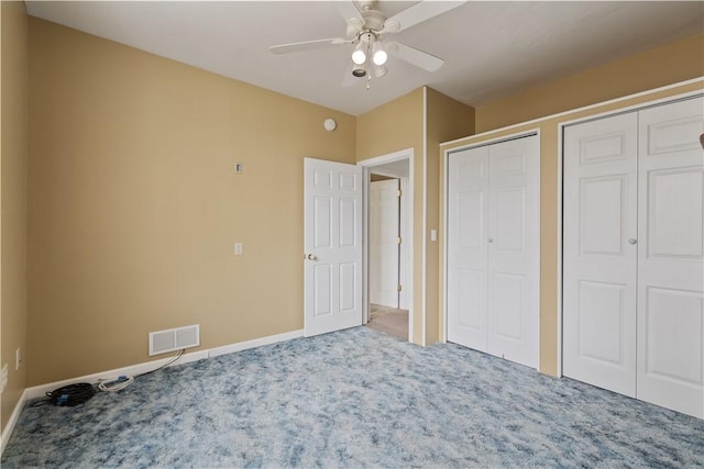 2101 Lonsdale St, Reserve, PA 15212 - unfurnished bedroom featuring carpet, two closets, baseboards, and a ceiling fan