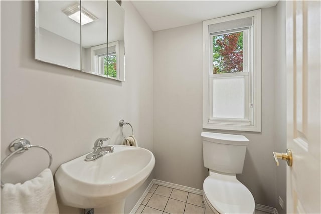 2101 Lonsdale St, Reserve, PA 15212 - half bathroom with a sink, toilet, baseboards, and tile patterned flooring