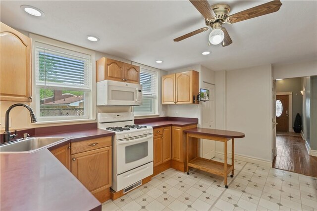 2101 Lonsdale St, Reserve, PA 15212 - kitchen with white appliances, a sink, a ceiling fan, recessed lighting, and dark countertops