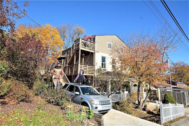 exterior space with stairway and fence