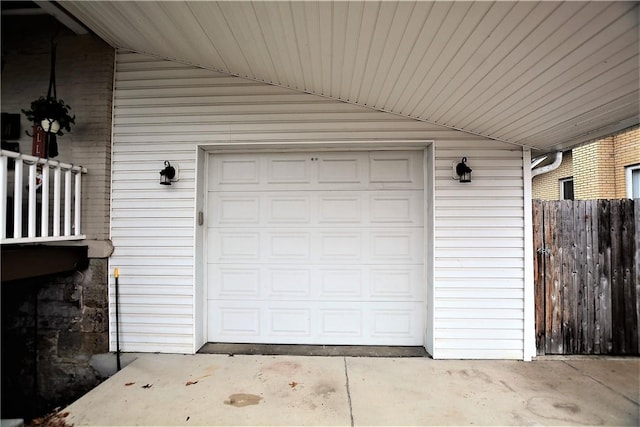 garage featuring fence