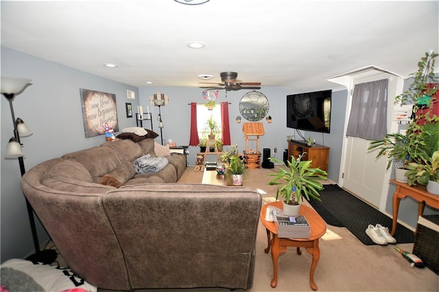 carpeted living room featuring a ceiling fan and recessed lighting