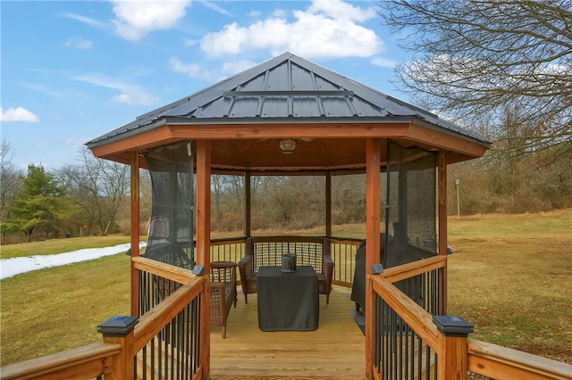 deck with a yard and a gazebo